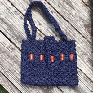 Navy crochet purse with brown wooden beads.